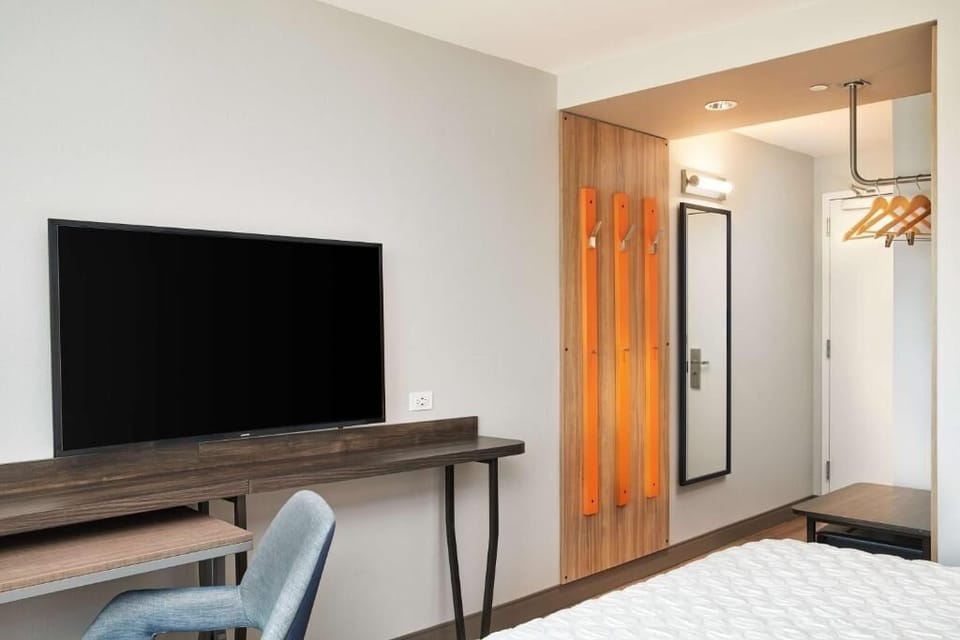 Kick back with a large TV and tidy, modern furnishings.