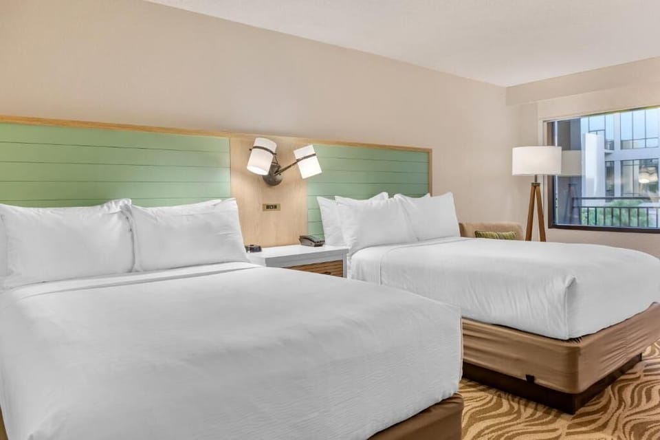 Wake up refreshed in bright, airy beds beside the window.