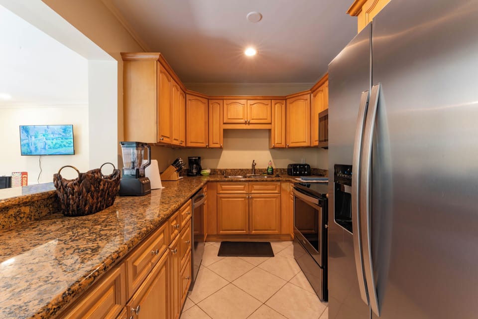 Spacious kitchen perfect for prepping meals, or late-night snacks.