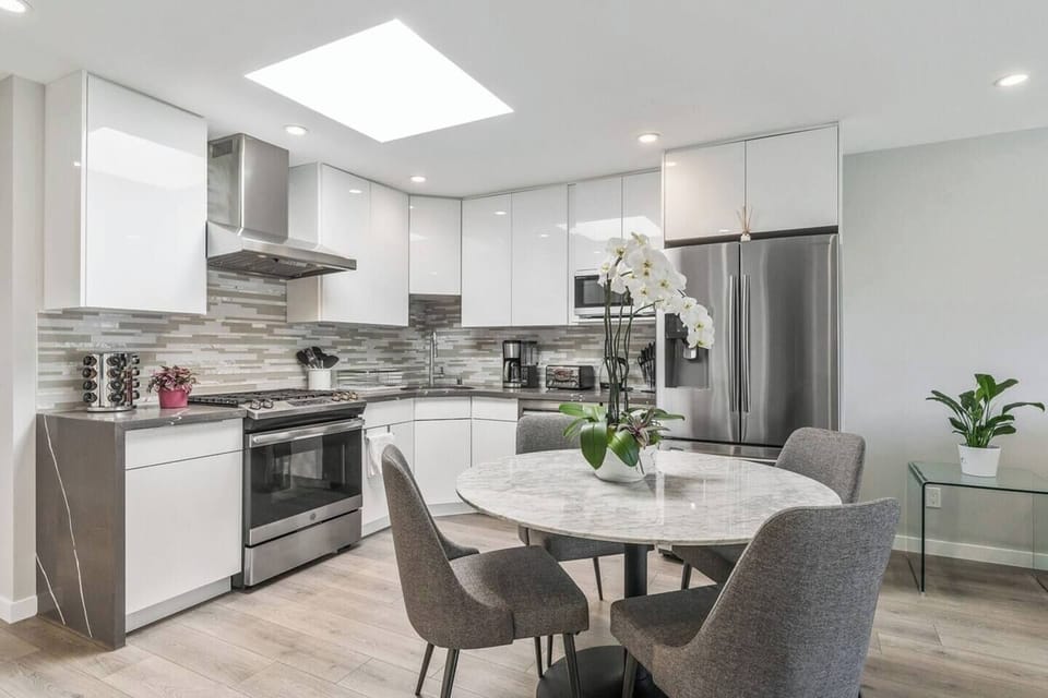 Self-contained kitchen with large fridge to store your food.