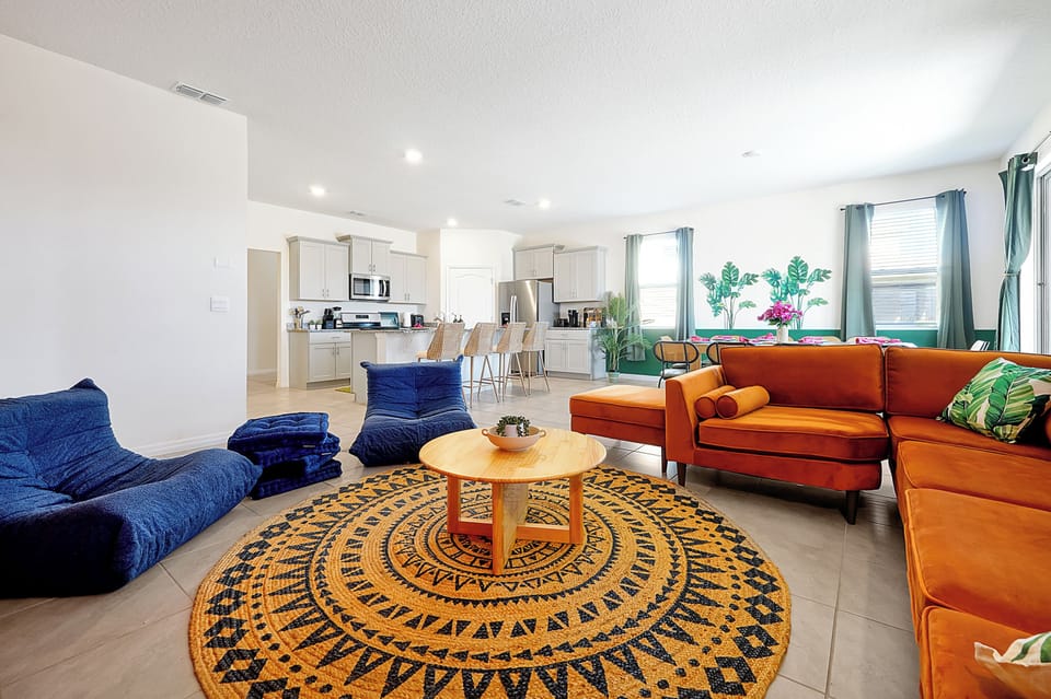Relax in our living room in an open floor plan concept w/ the dining and kitchen