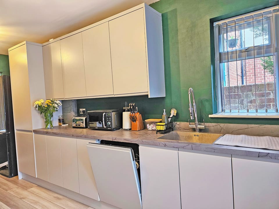 Kitchen, dishwasher, fridge, microwave, toaster