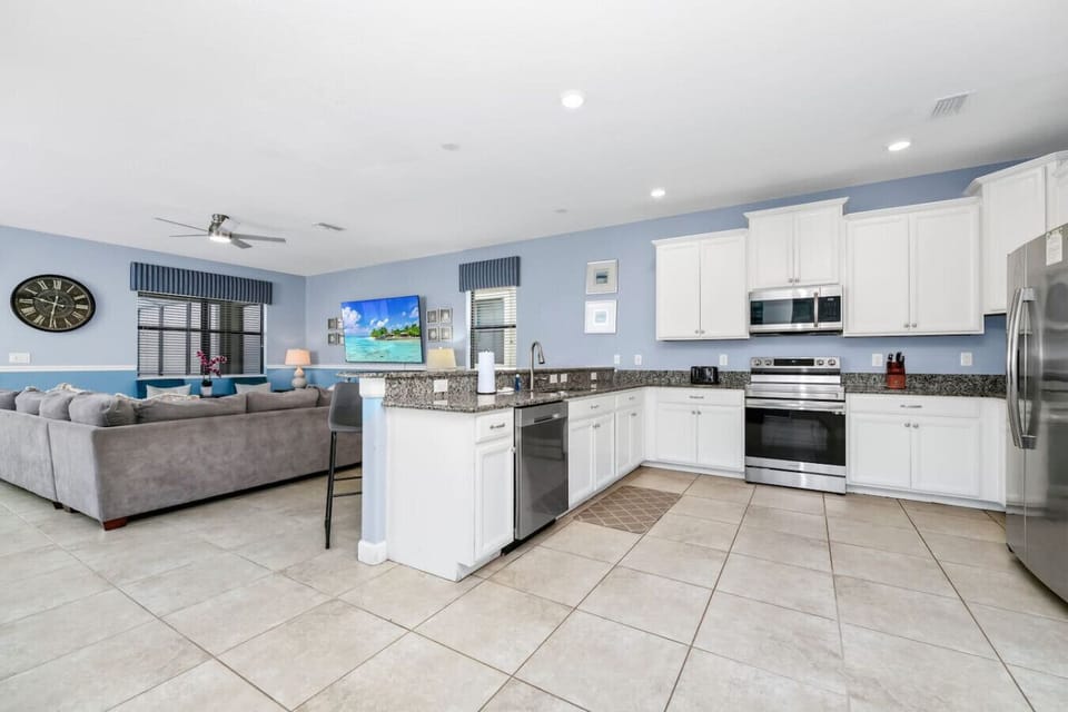 Cook with ease in the fully equipped kitchen—complete with modern appliances, cookware, and plenty of space.