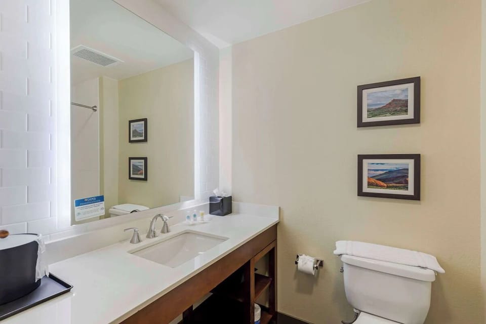 Get ready comfortably with generous counter space and bright lighting.