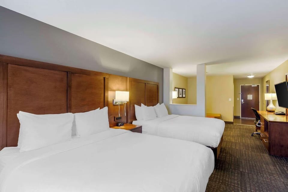 Drift off on cloud-soft pillows in a roomy double-queen.