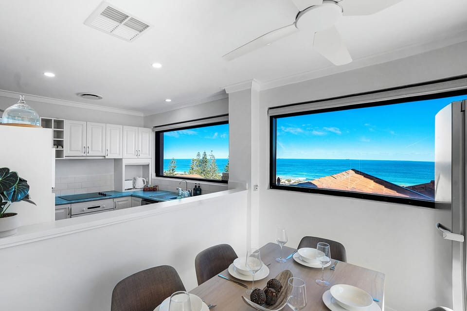 Cooking with a view—where natural light meets sky-high serenity.