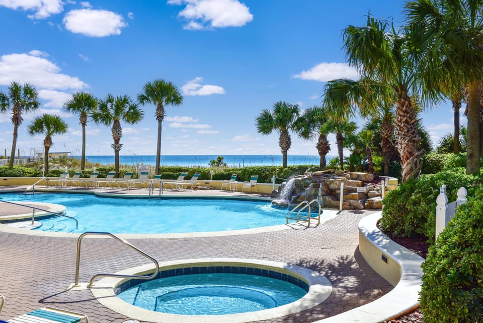 The spacious pool has views of the Gulf