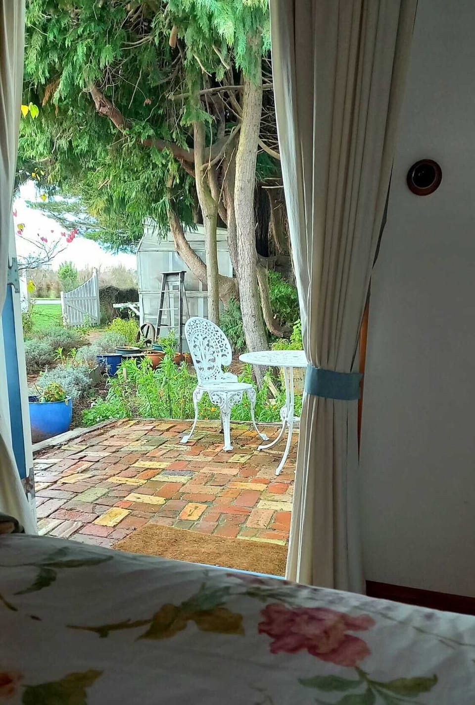 Patio and cottage garden access from bedroom 