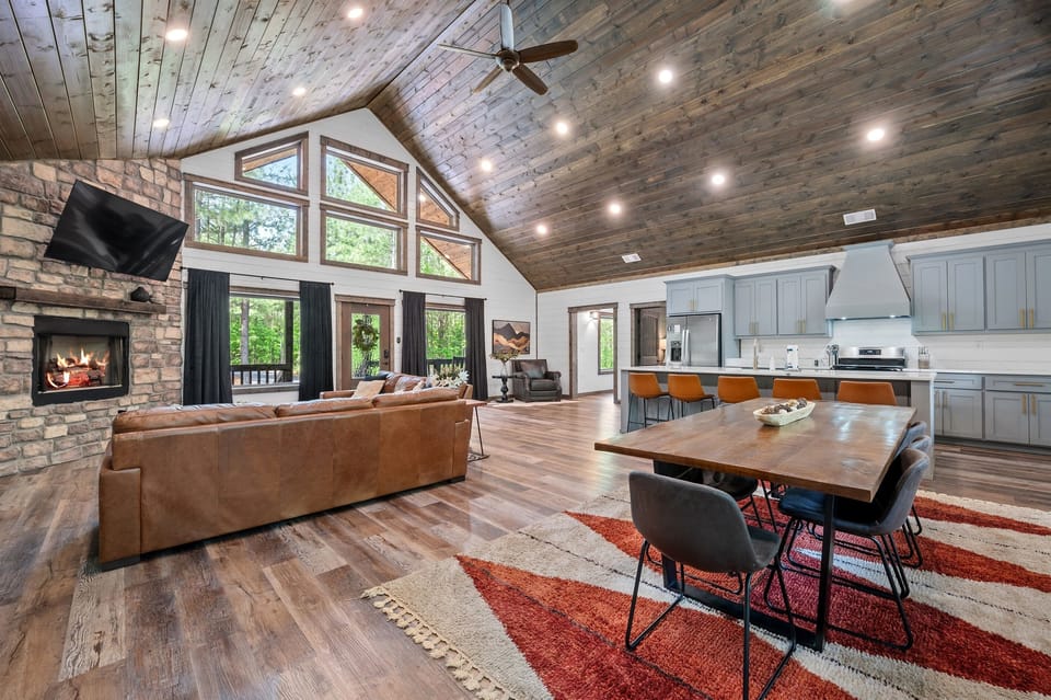 Dining table seats 8 with room for 5 more at the island — perfect for shared meals and laughter.