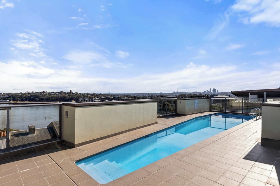 Dive into relaxation at our stunning rooftop pool, offering breathtaking, unblocked panoramic views of the city skyline. Perfect for a refreshing swim or lounging while soaking in the vibrant city lights — an urban oasis above it all.