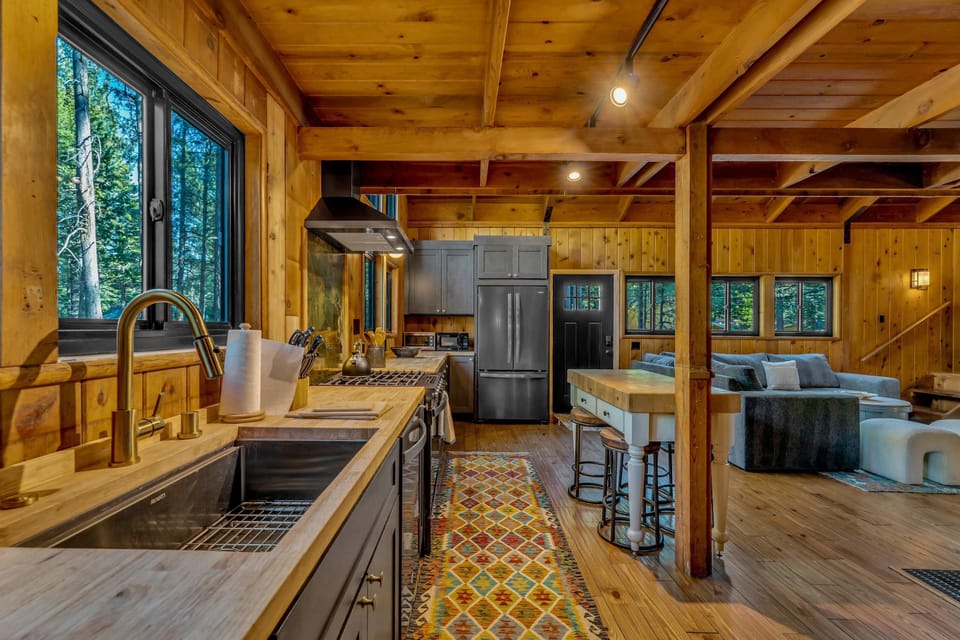 Kitchen: Main floor, drip coffee maker, Keurig, toaster, cooking utensils, tableware