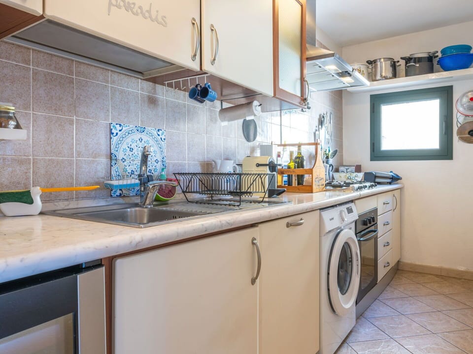 Kitchen, Major Appliance, Kitchen Appliance, Countertop, Kitchen Sink, Sink, Flooring, Cabinetry, Plumbing Fixture, Floor