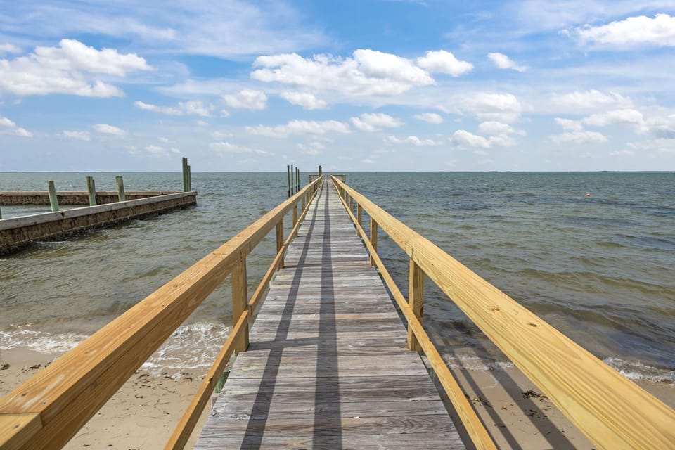 Pier with railing and seating at the end great for fishing