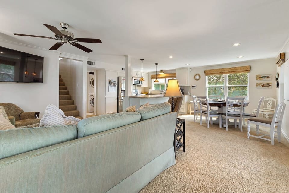 Amazing open living space! Living room, kitchen and dining area - stairs to the upstairs living space