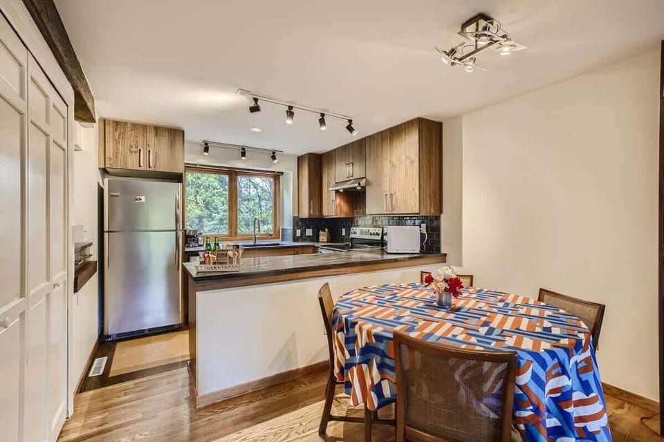 Dining Area Near the Kitchen for Easy Meals  