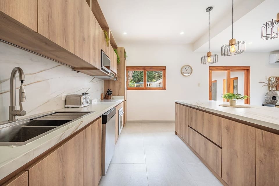Chef-inspired kitchen with professional-grade stove and oven.