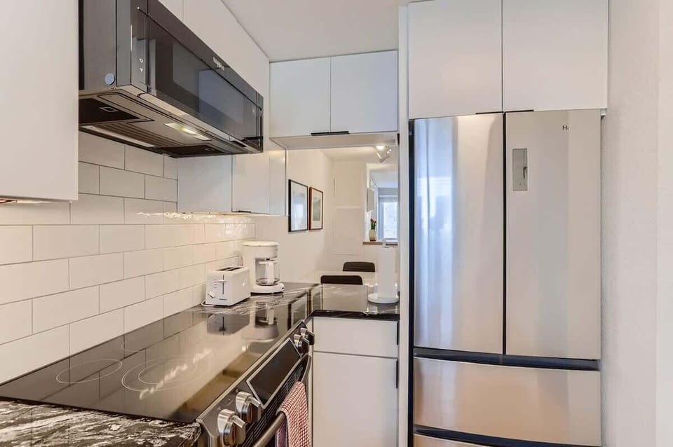 Kitchen with window into the Dining Area 