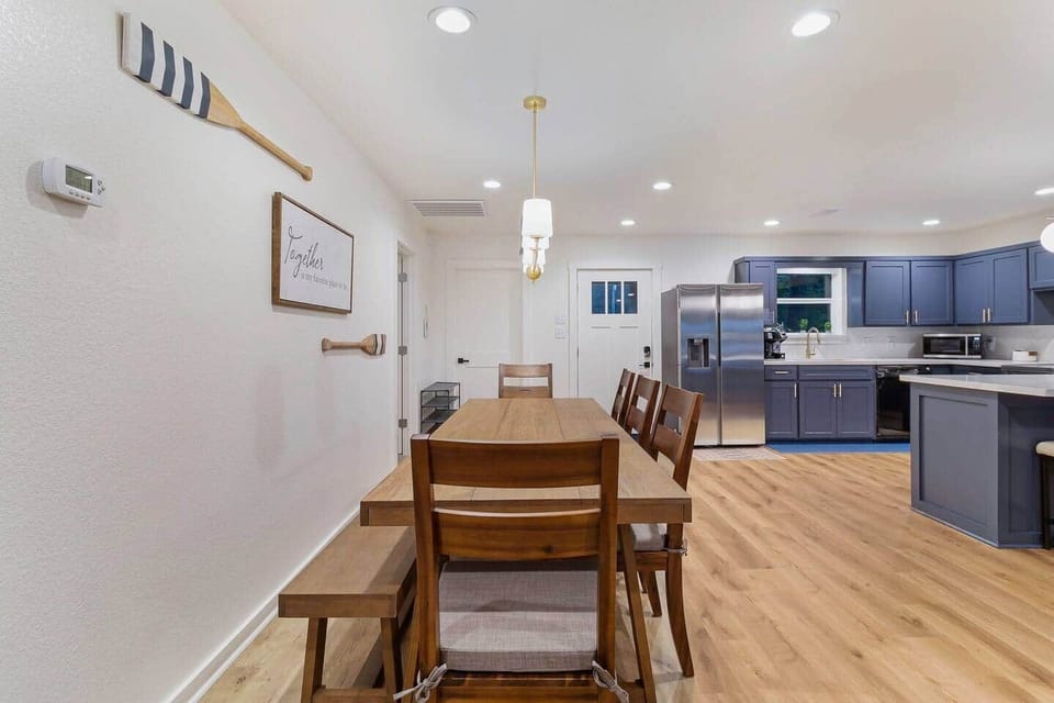 Dining table and kitchen facing front of the house