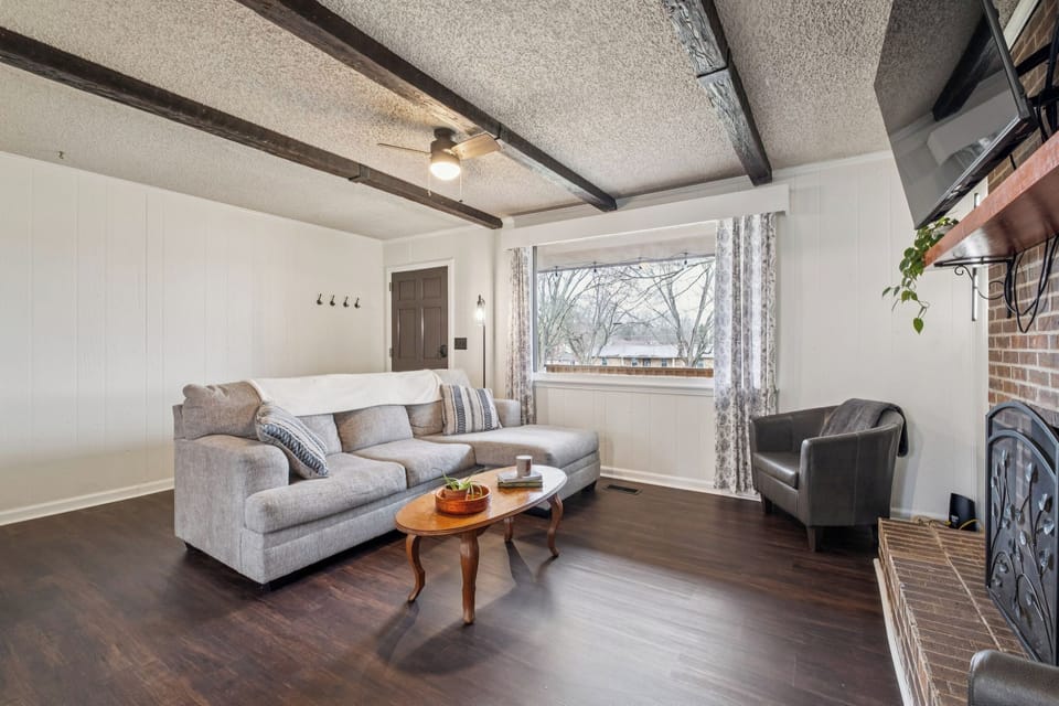 Living room with large bright front window
