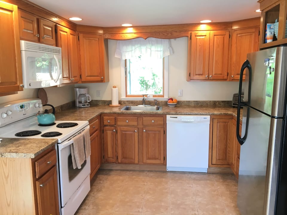 Kitchen with micro, dishwasher, fridge, range, coffee maker, toaster oven