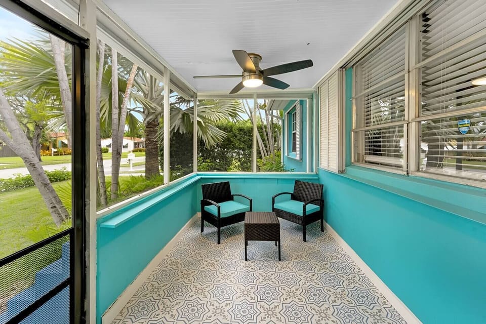 Cozy porch with a seating area and views of the outdoors.