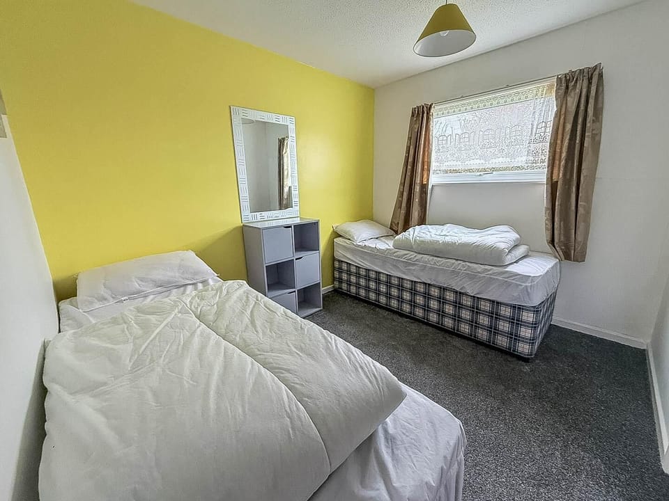 Featuring a built-in storage for added convenience for your UK getaway.