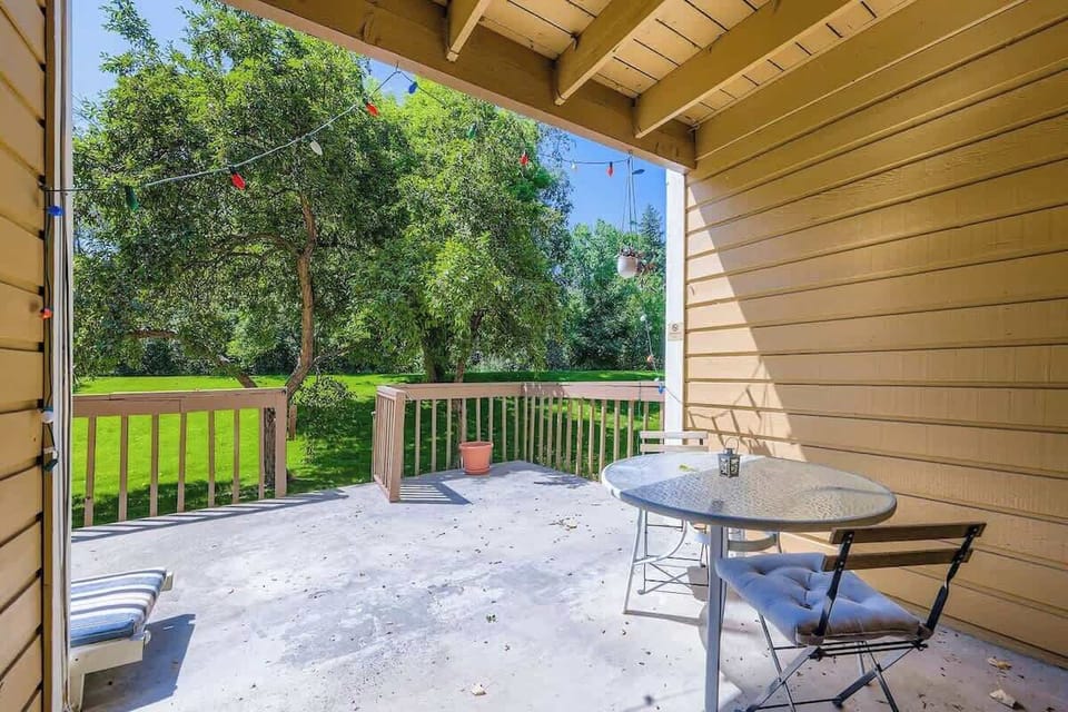 Step outside to a private patio, a comfortable space for unwinding, socializing, or enjoying the outdoors in privacy.