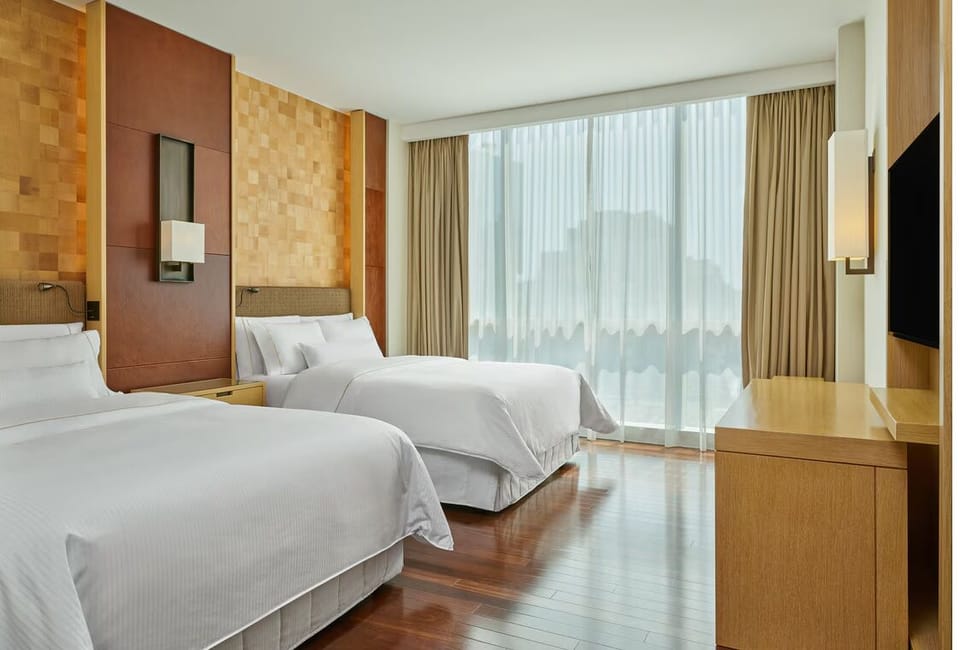 Settle in with in-room entertainment and an easy work setup.