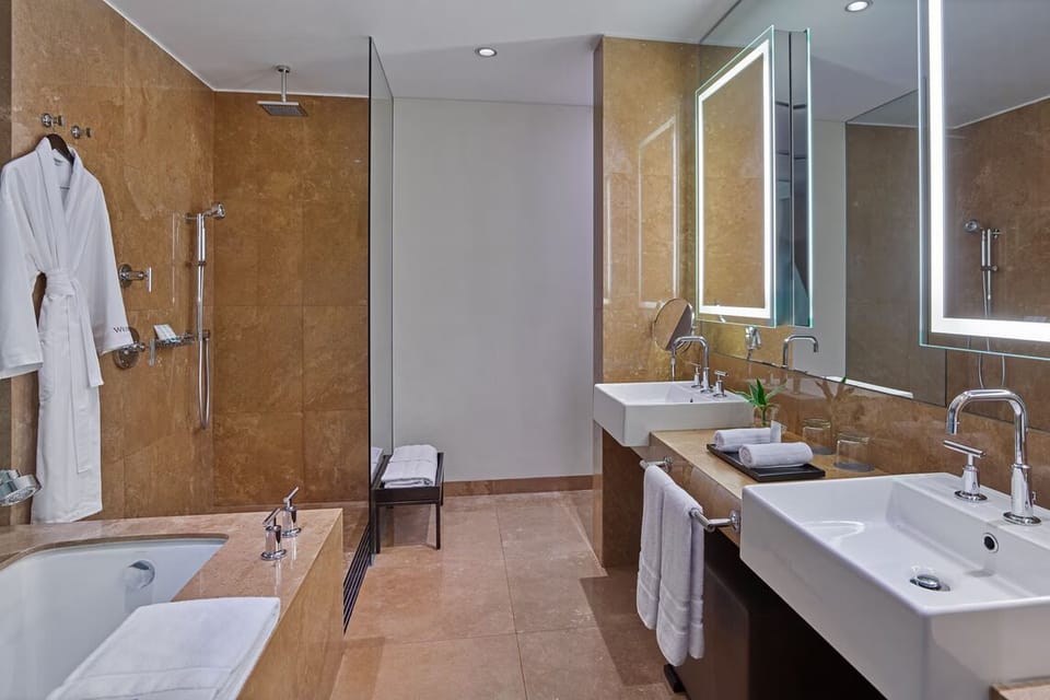 Refresh in a spa-like bath with rainfall shower comfort.