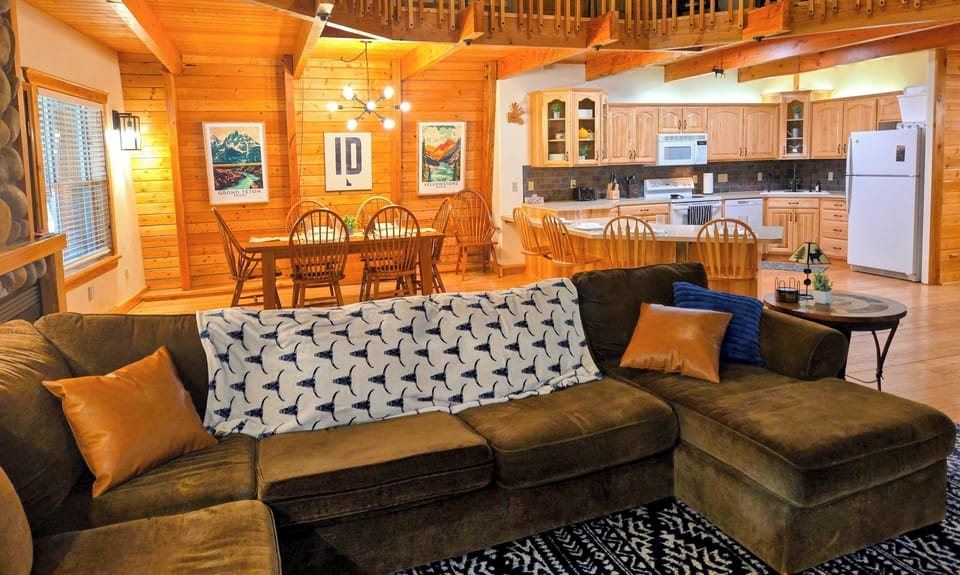 Open concept kitchen, dining, and living room areas