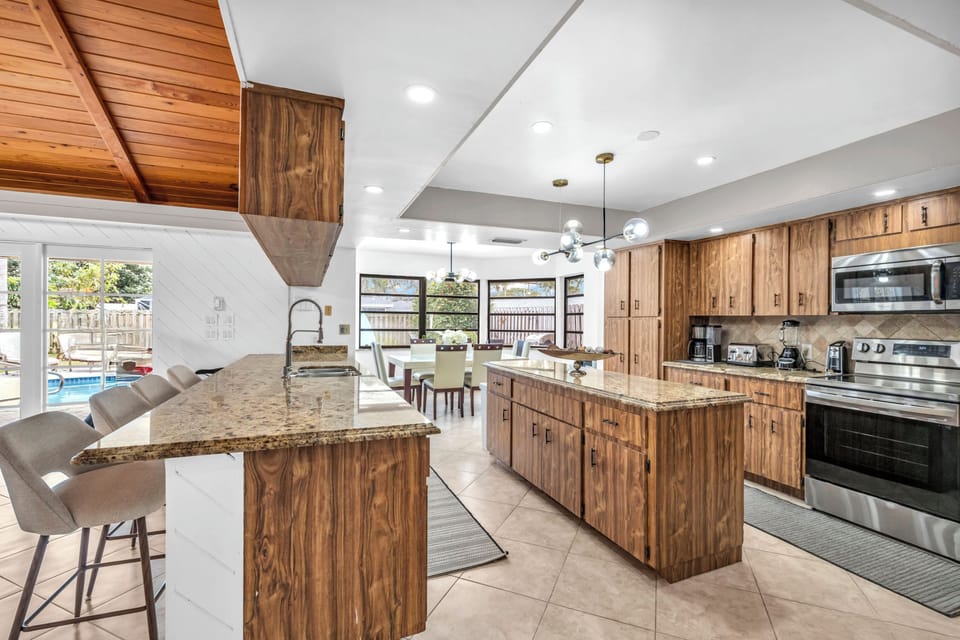 Granite countertops and wood cabinetry make this kitchen warm and functional.