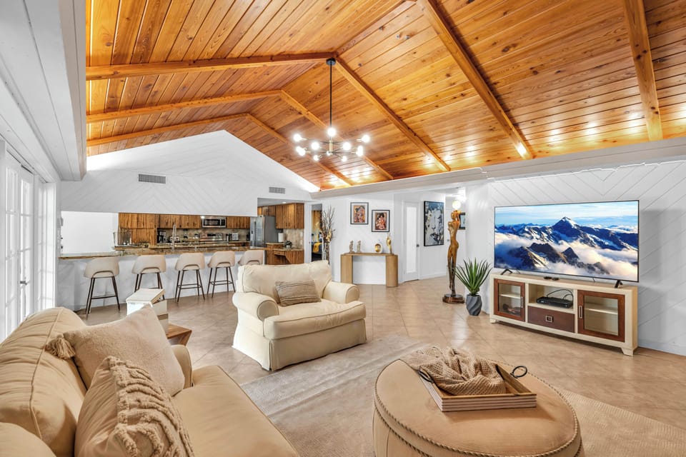 Open layout connects the living room to kitchen and dining for easy flow.