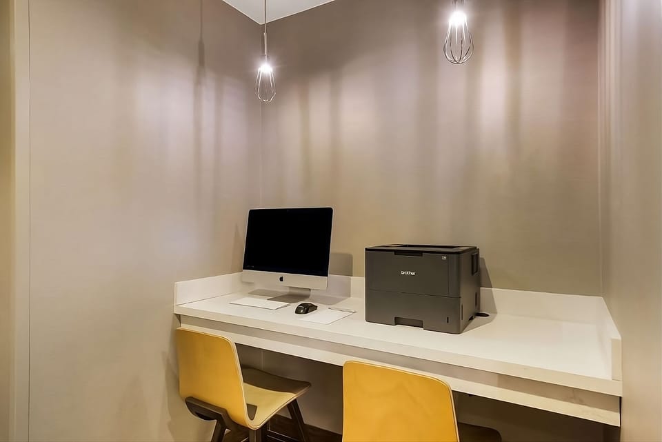 Settle in to focus with a quiet, modern workspace.