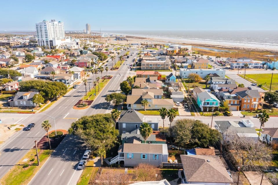 Another aerial shot showing the vibrant neighborhood near the water.