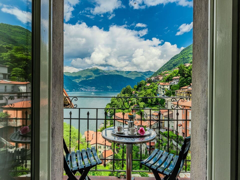 Cloud, Sky, Water, Mountain, Table, Building, Plant, Window, Nature, Green