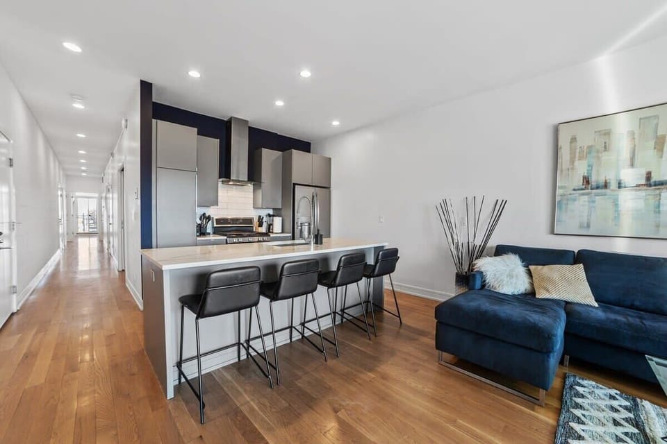 Bright open kitchen flowing into a welcoming lounge