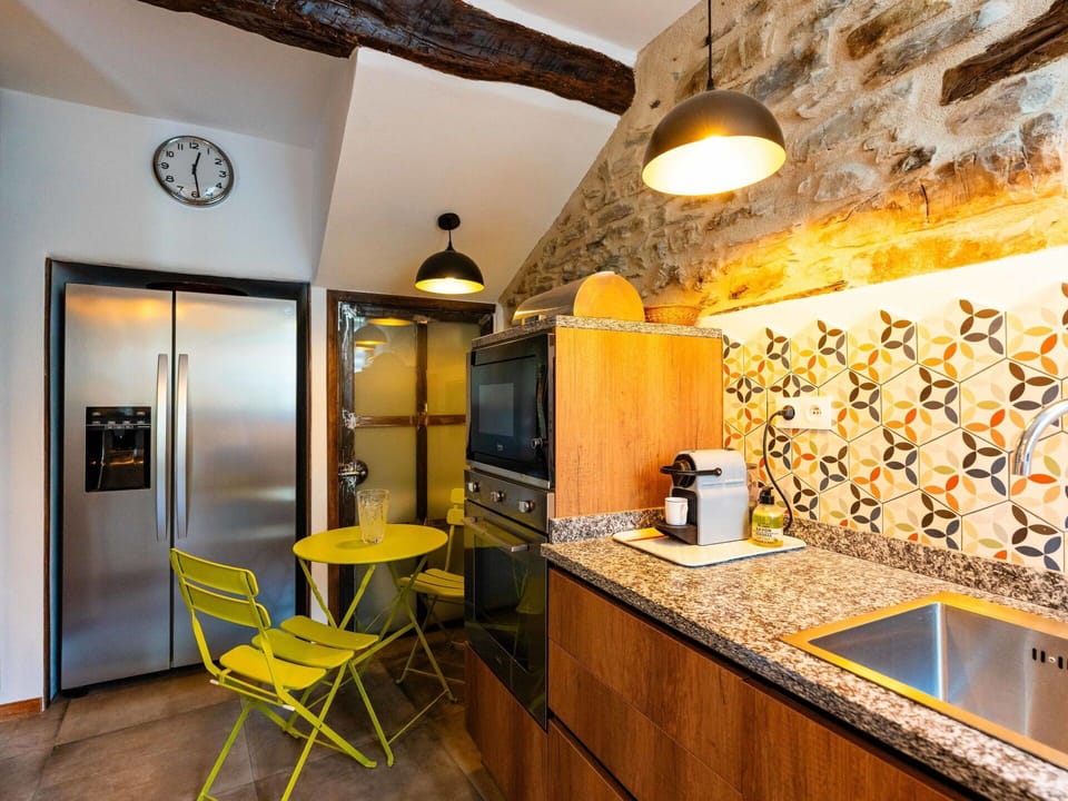 Interior Design, Furniture, Yellow, Kitchen, Wood, Flooring, Floor, Countertop, Ceiling, Lighting
