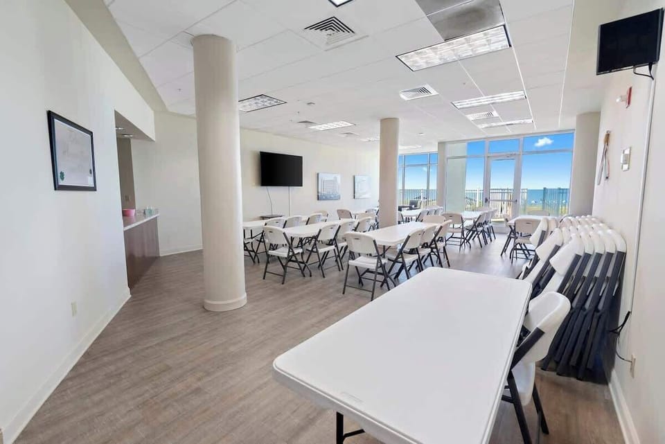 This room is a meeting room that is available to use.  You must reserve it but it works great for family reunions, parties, etc.  There is a wet bar and you can arrange catering with an outside company.