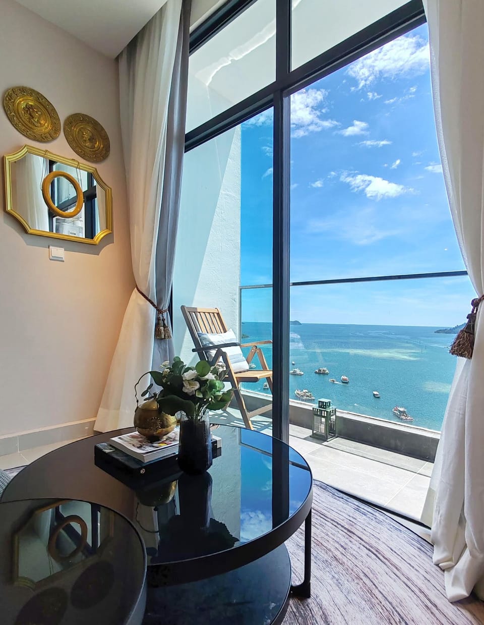 Open the drapes to endless blue — a quiet balcony where sky and sea embrace.