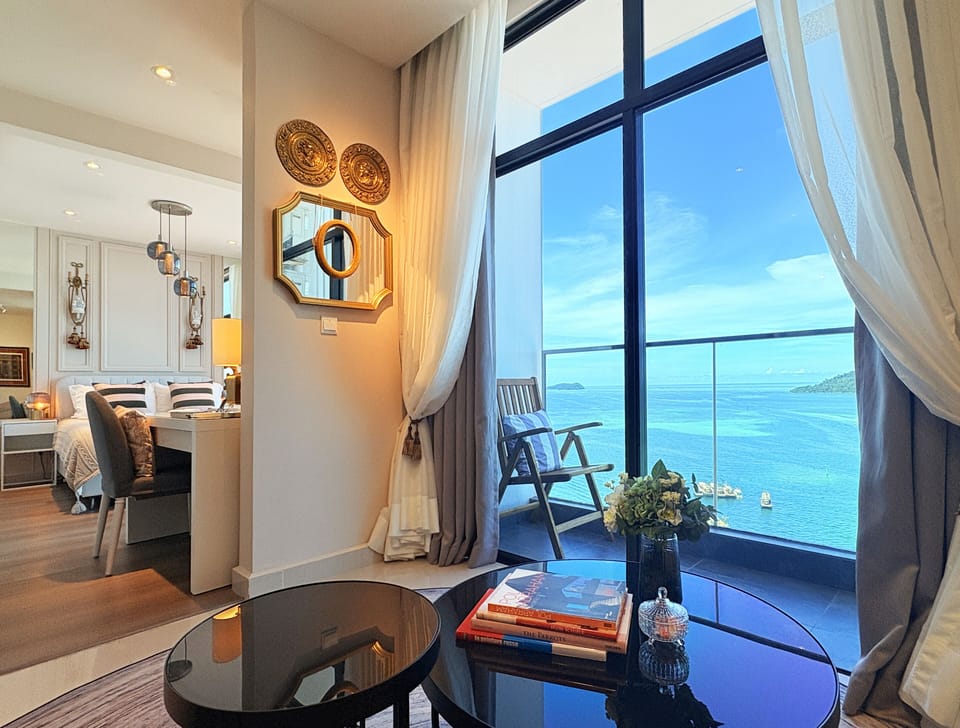Morning light and ocean breeze flow in- a private balcony for slow,sweet moments