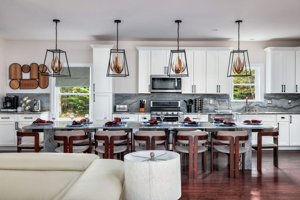 Host your Family Meals in this 12 person Dining Suite. This elegant chef’s kitchen offers the perfect space to come together, preparing favorite meals for any occasion - a casual breakfast or a celebration feast, all in refined, sunlit surroundings.