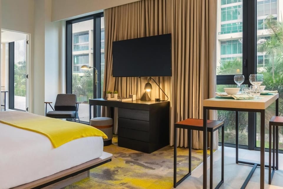 Unwind in a bright studio with dining nook and views.
