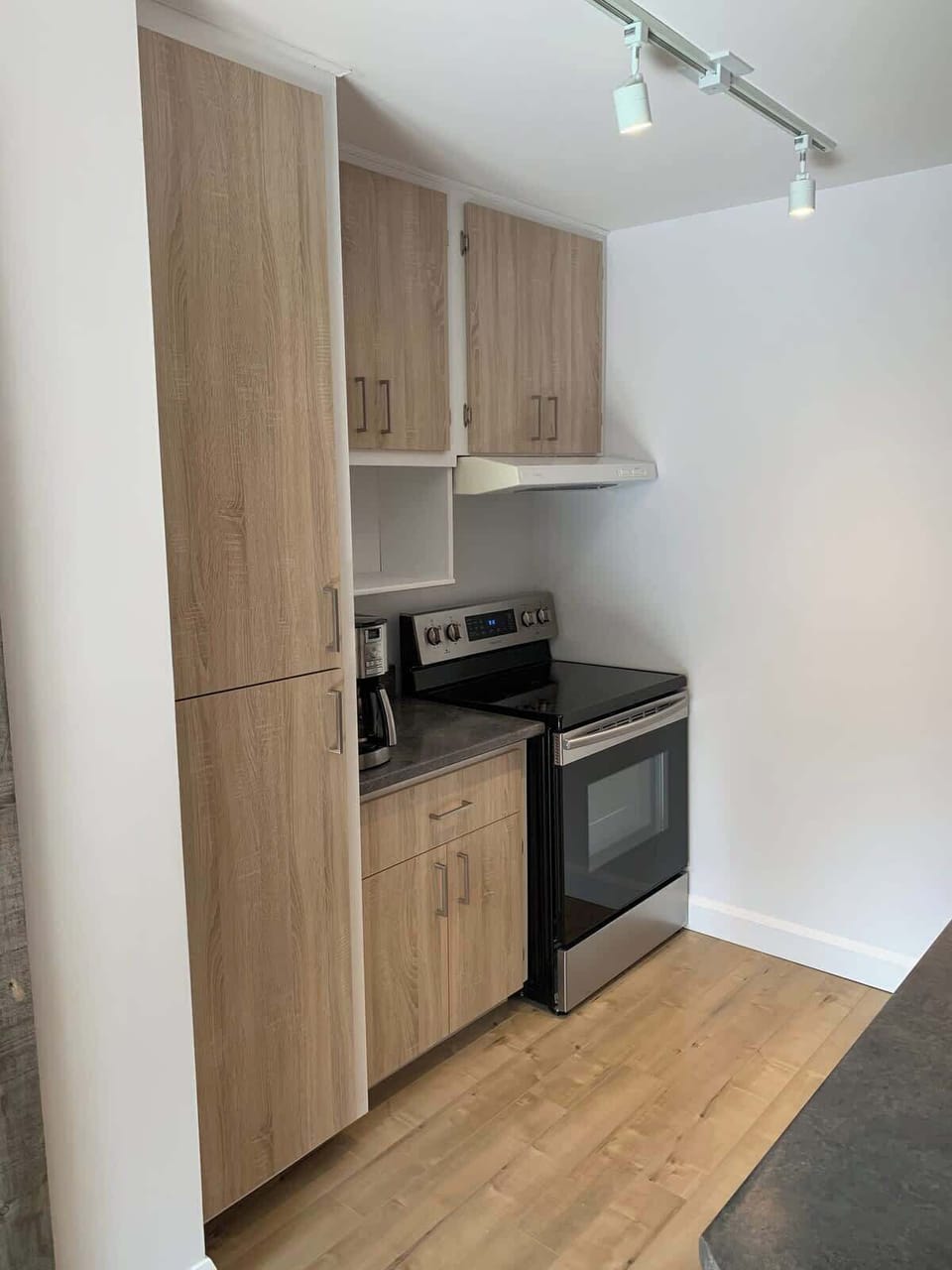 Sleek cabinetry and modern appliances await your culinary adventures!