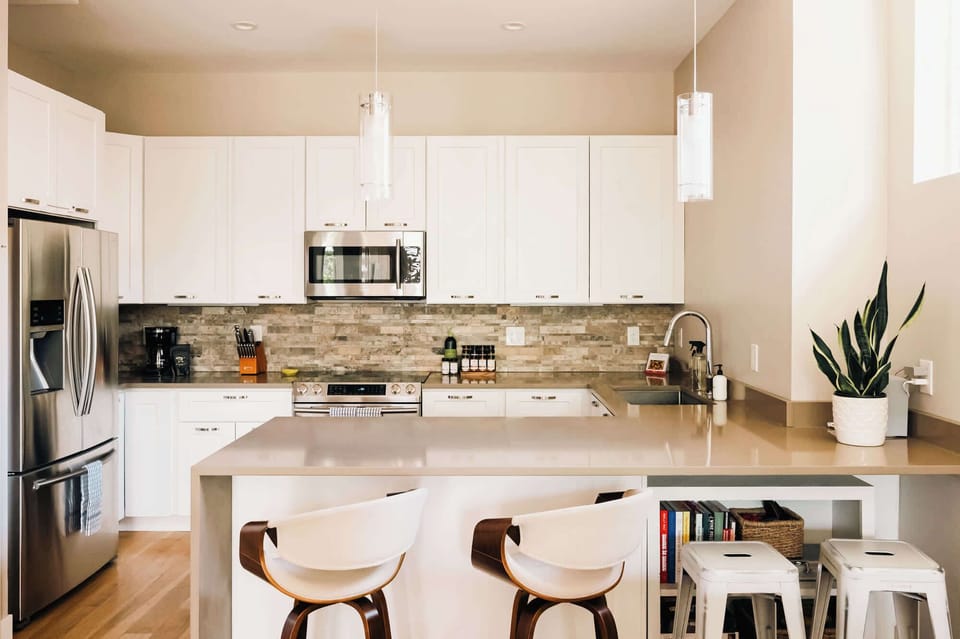Open kitchen with island bar-style seating