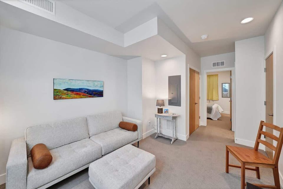 Downstairs living room space with TV for maximum comfort 