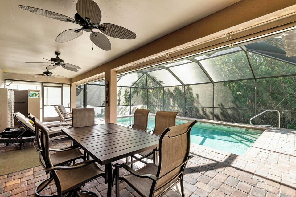 Covered Outdoor Dining Area With Ceiling Fans