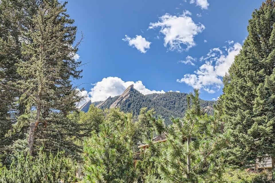 Enjoy a charming peek at the flatirons right from the property