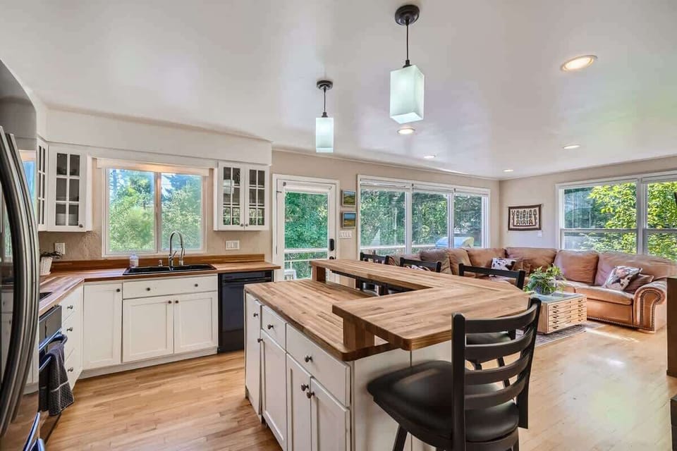 Open kitchen and second living area perfect for work or relaxation