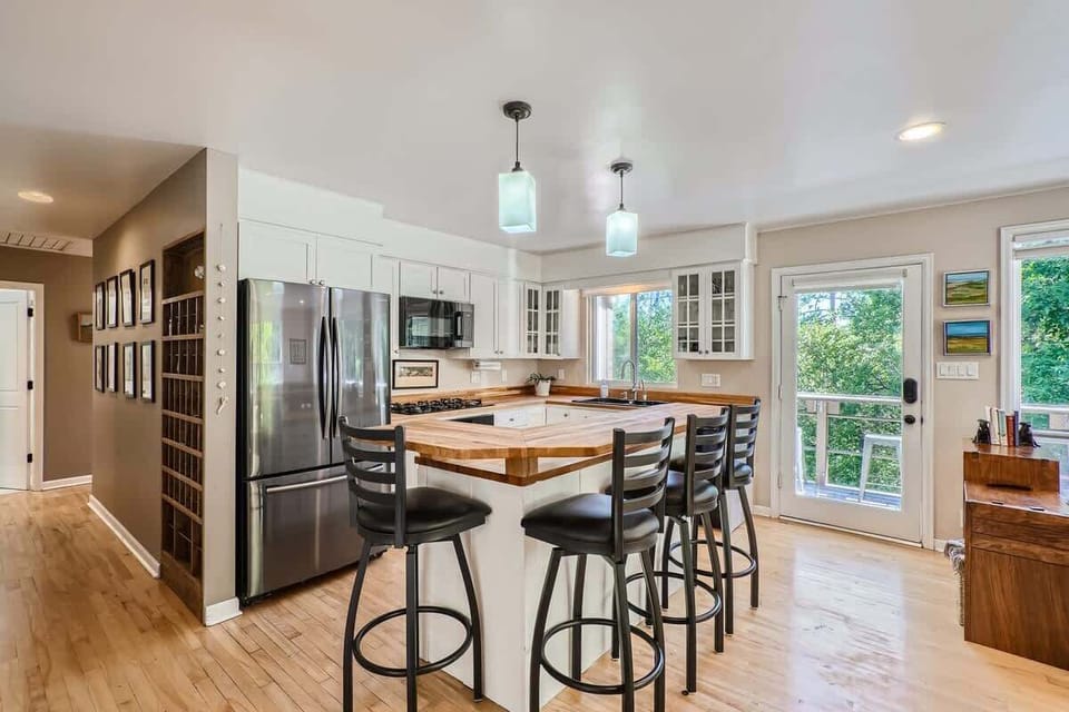 Bar top seating for four in the bight kitchen 