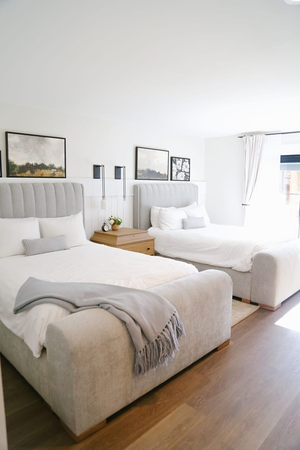 Unwind in bright, cloud-soft beds with calming daylight views.